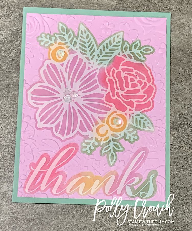 This is an alternative card made with the June Paper Pumpkin kit. It has a Soft Succulent card base with a floral embossed Fresh Freesia card front and an ink colored vellum floral cutout with a vellum Thanks sentiment.
