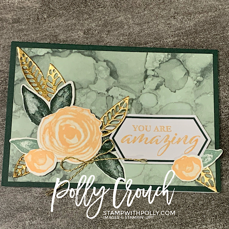 This is a notecard made with the June Paper Pumpkin kit. It is an Evening Evergreen base with a soft succulent overlay and Pale Papaya flowers and gold foil leaves. The sentiment says You are amazing.